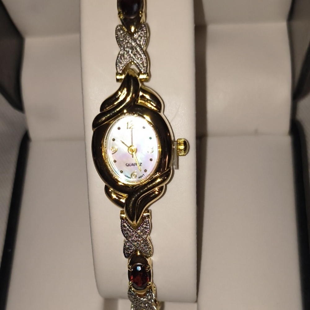 Avon Women's Gold and Silver Watch with Gem Details